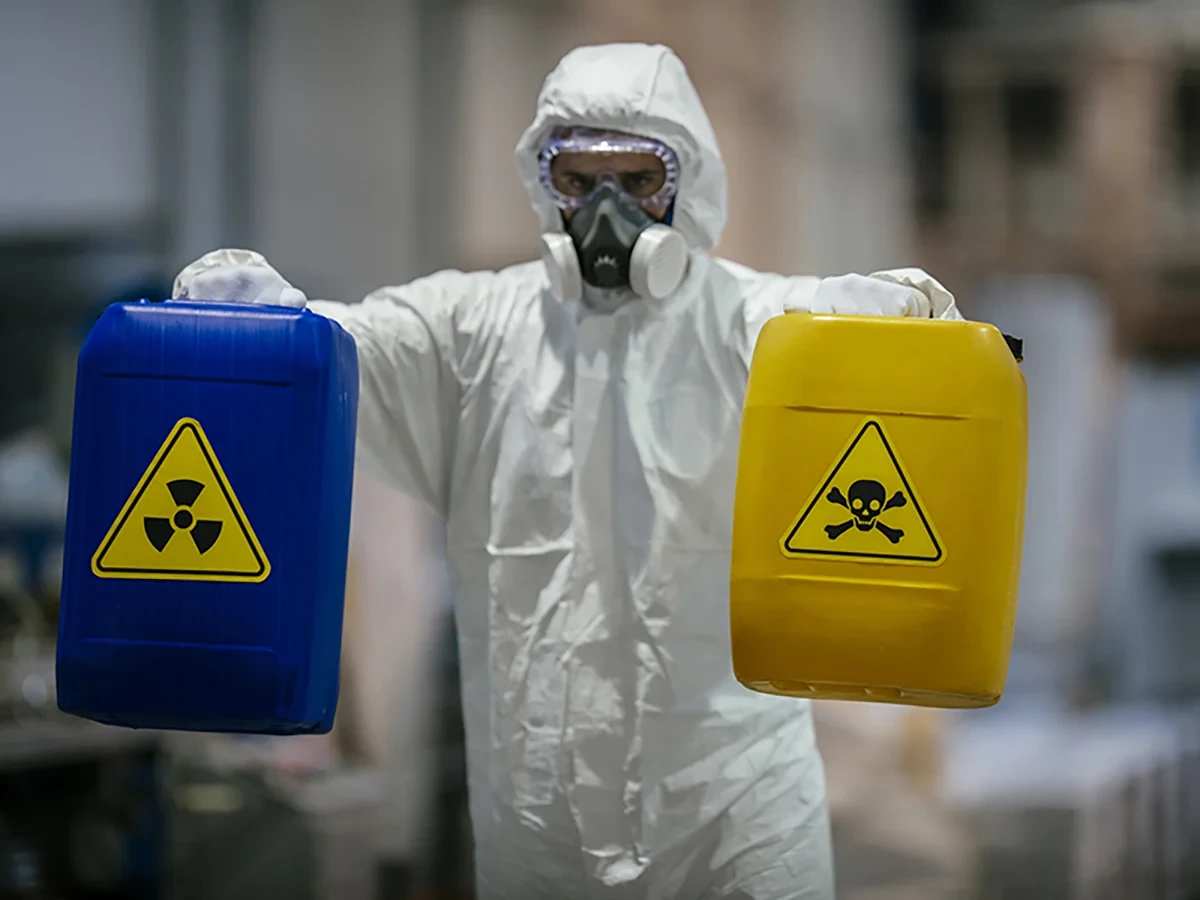 Biohazard cleanup technicians in protective equipment at a remediation scene in Mount Vernon, WA